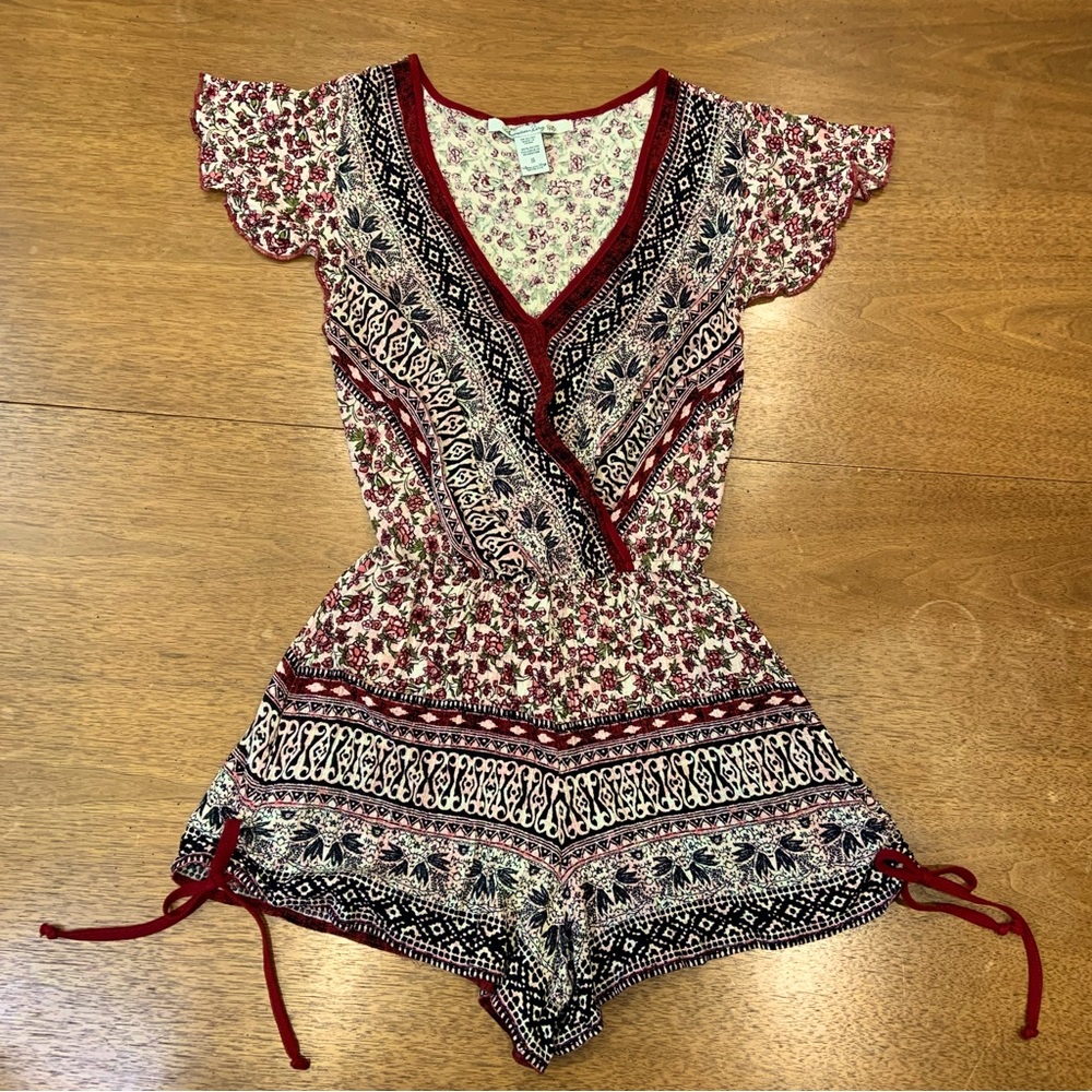American Rag floral printed boho romper with flutter sleeves and v-neck